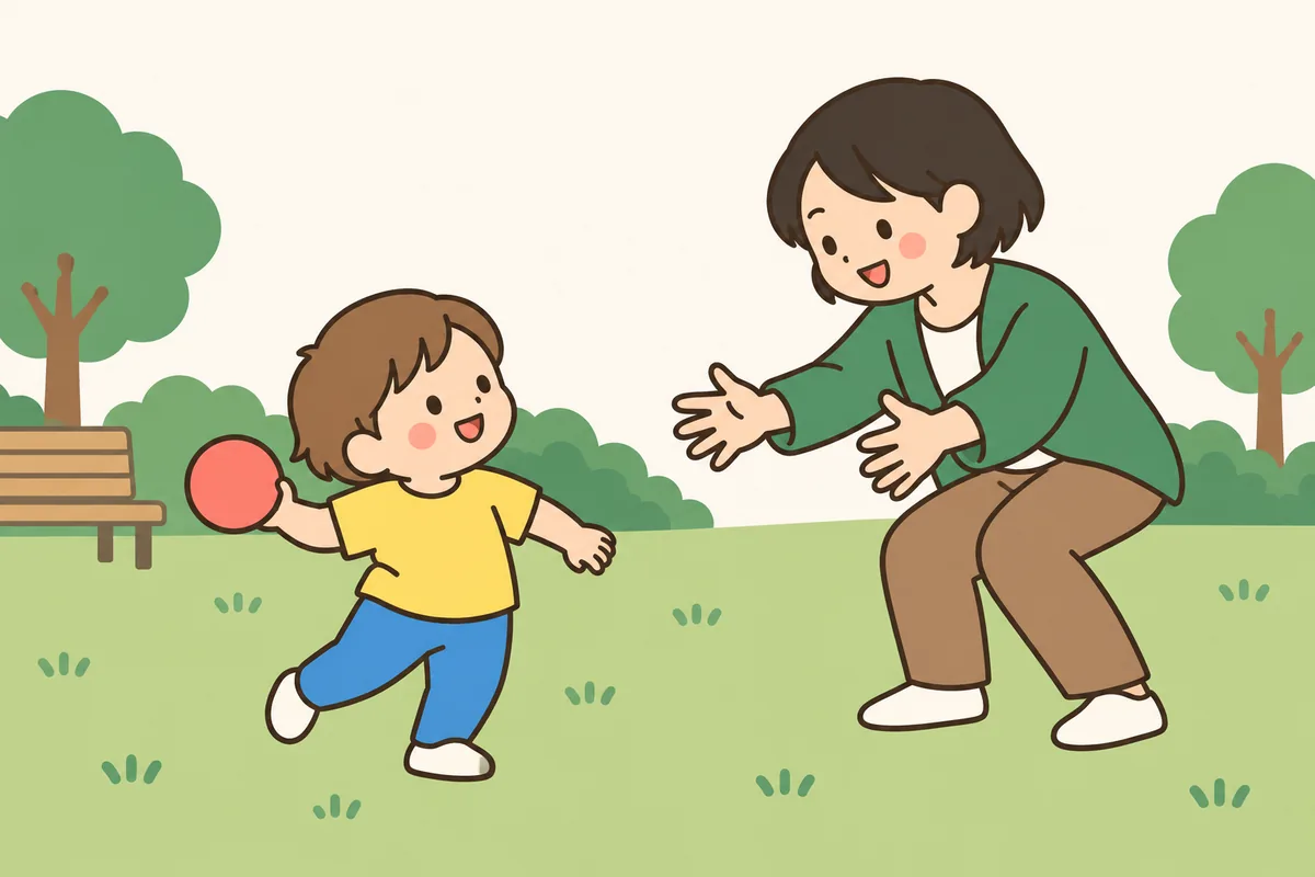 公園でボールを投げようとして、よろけている子どもと、受け止めようとする大人