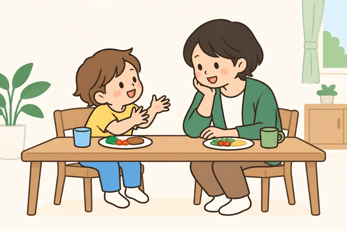食卓で子どもが一生懸命に話し、大人がゆったり聞いている