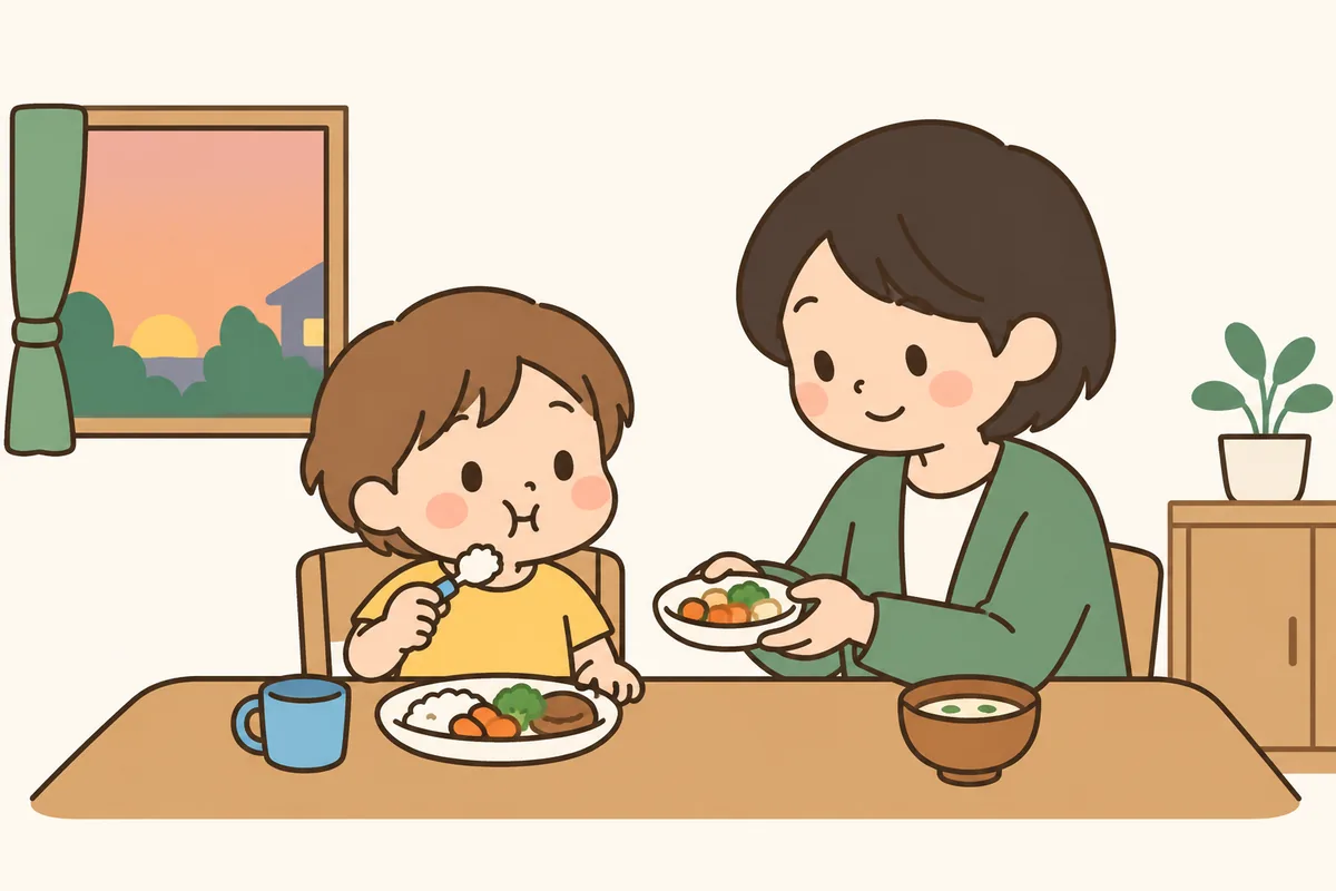 食卓で、口いっぱいにごはんをほおばる子どもと、隣で見守る大人