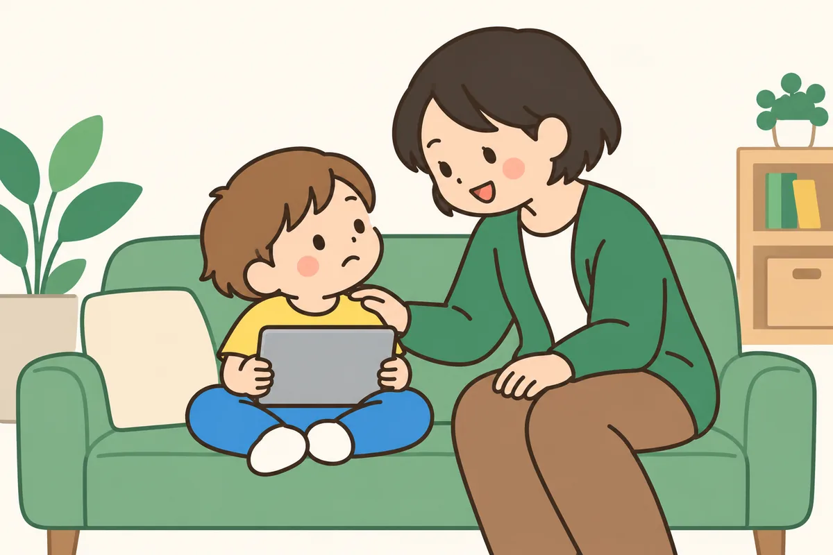 タブレットで動画を見る子どもに、大人が声をかけている