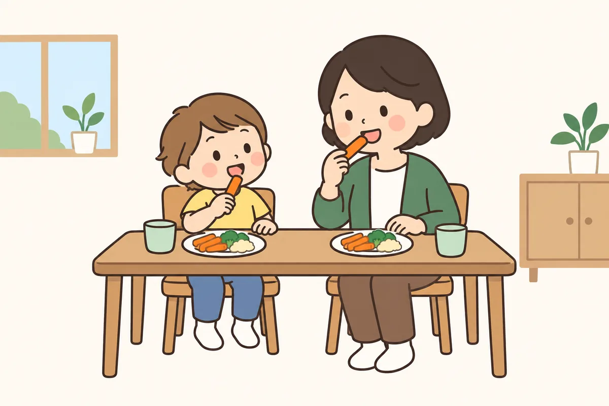 大人がスティック状の野菜をかじって見せ、子どもがまねしている