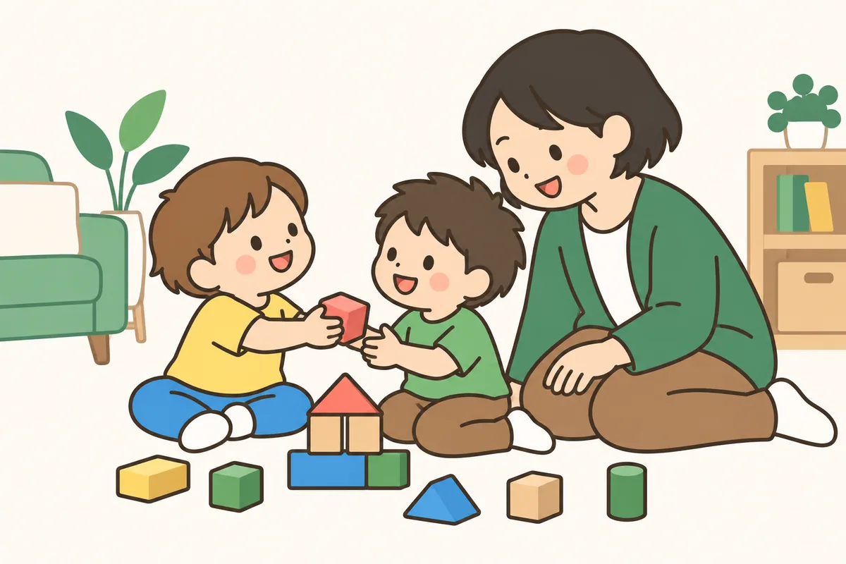 おもちゃを友だちに渡した子どもに、大人が笑顔で話しかけている
