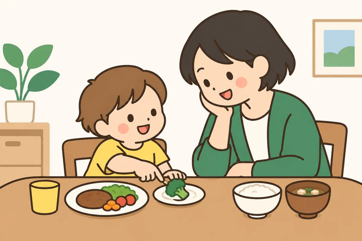 小さなお皿のブロッコリーを、子どもが指でつついている