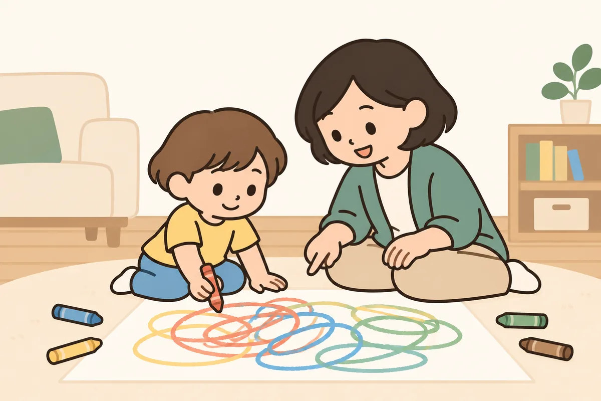 床に広げた大きな紙に、子どもが太いクレヨンでぐるぐると描き、隣で大人が見守っている。