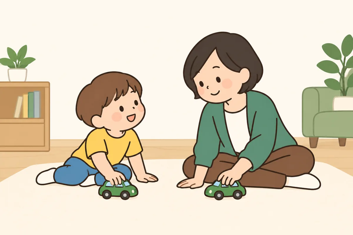 子どもと大人が、同じ車のおもちゃを並んで走らせている