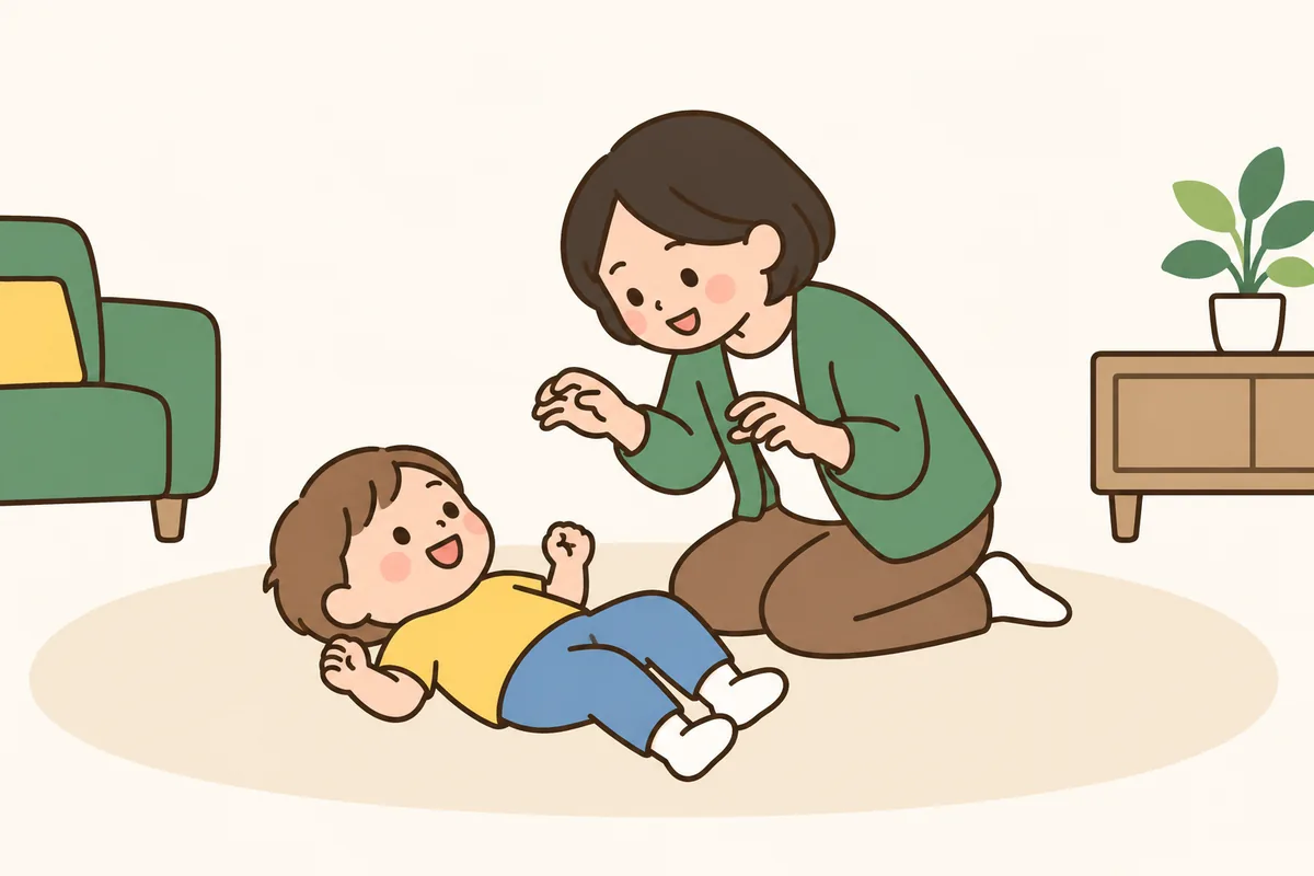 大人がくすぐる手を止めて、笑顔の子どもと目を合わせて待っている